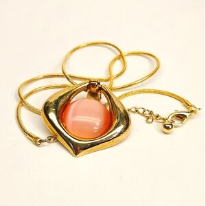 Pink Cat's Eye Pendant And Gold Necklace